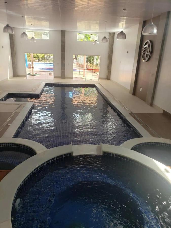 Agradavel Flat - Cavalinho Branco - Aguas De Lindoiaアパートメント エクステリア 写真